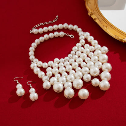 Pearl tassel necklace set with exaggerated geometric round beads and multi-layer collarbone chain