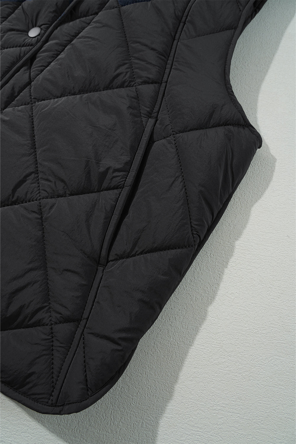 Black Quilted High Neck Button Up Pocket Vest Coat