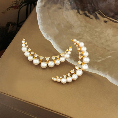 Zircon moon shaped earrings imitating pearl earrings are fashionable