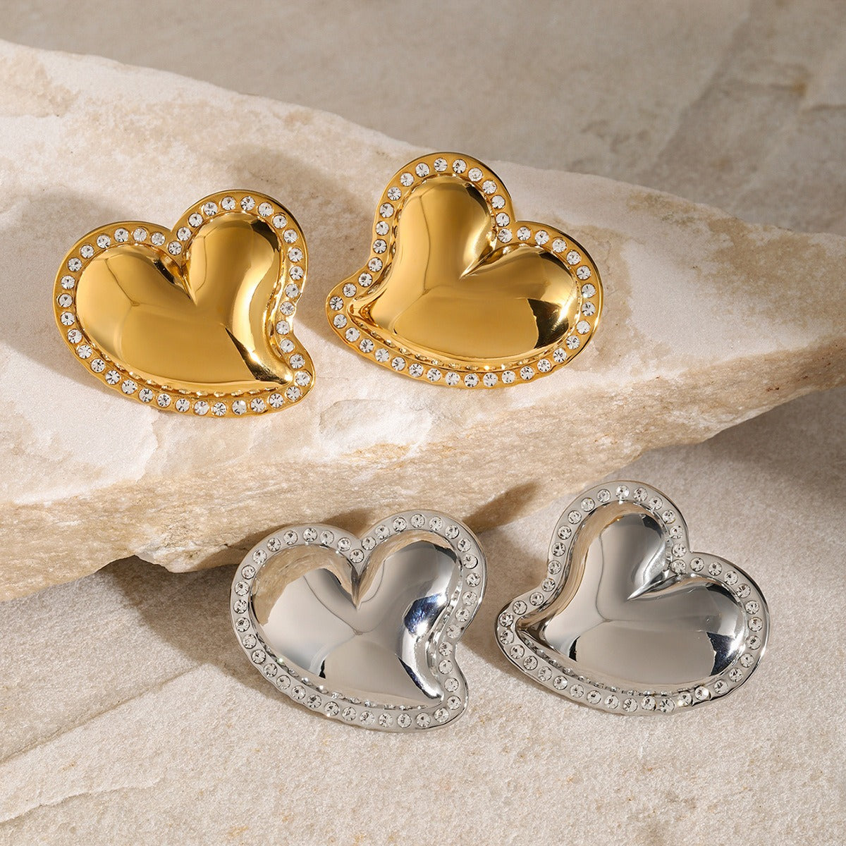 White rhinestone smooth slanted heart-shaped earrings